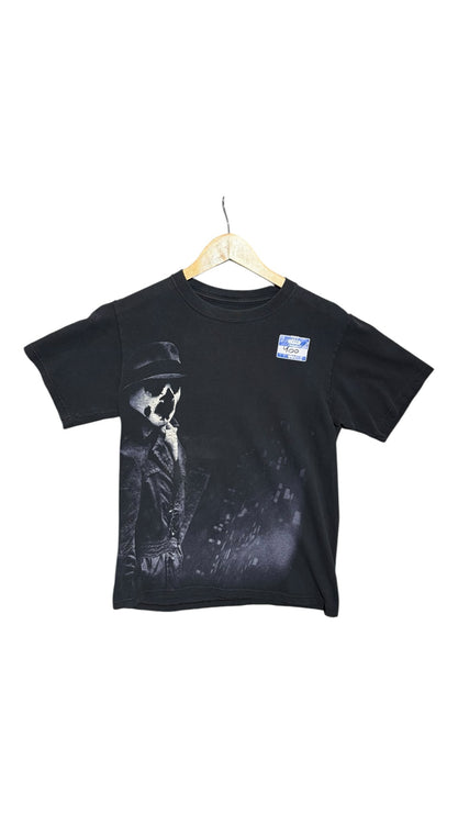 OutOf10 black cotton crewneck t-shirt featuring a graphic print of Rorschach from Watchmen on a hanger.