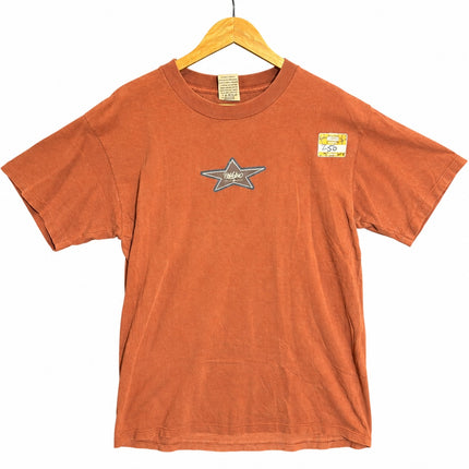 OutOf10 rust-orange vintage-inspired cotton crewneck t-shirt with a star graphic on the chest on a wooden hanger