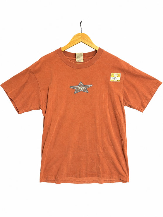 OutOf10 rust-orange vintage-inspired cotton crewneck t-shirt with a star graphic on the chest on a wooden hanger