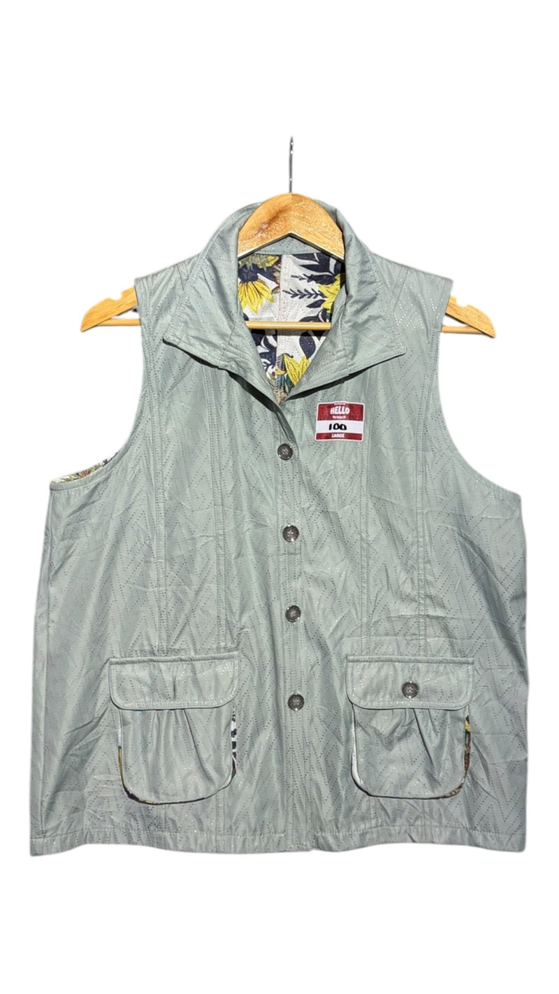 OutOf10 sage green quilted utility vest with button front, flap pockets, and floral interior lining on a hanger.