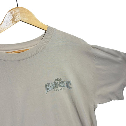 OutOf10 sand-toned cotton t-shirt featuring a small Aloha Island Magic Hawaii graphic on the chest