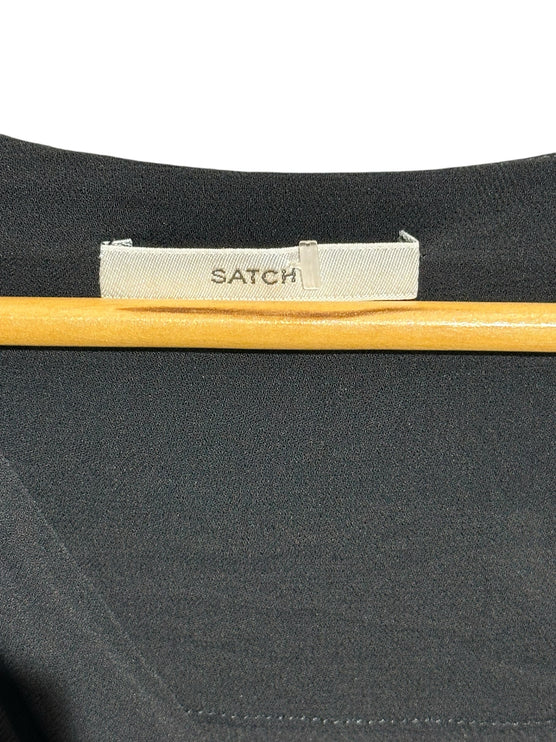 OutOf10 SATCH sleeveless black midi dress featuring a branded fabric label on a wooden hanger