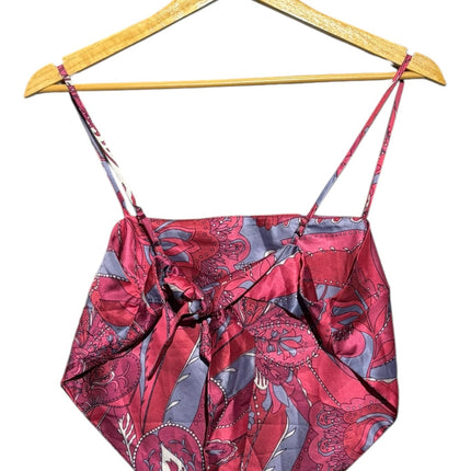 OutOf10 satin scarf-style crop top in pink and purple paisley print with spaghetti straps and tie-back closure.