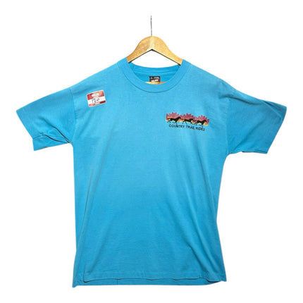 OutOf10 sky blue short sleeve t-shirt with a small Country Trail Rides horse graphic on the chest.