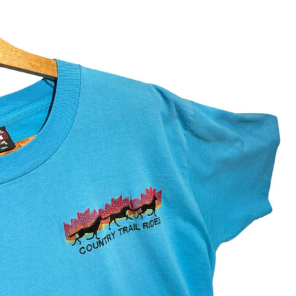 OutOf10 sky blue short sleeve t-shirt featuring a vintage Country Trail Rides horse graphic with a sunset maple leaf