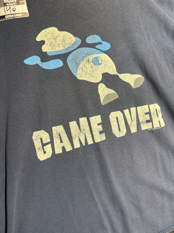 OutOf10 slate-blue cotton t-shirt featuring a distressed retro Game Over graphic print with a vintage gaming character.