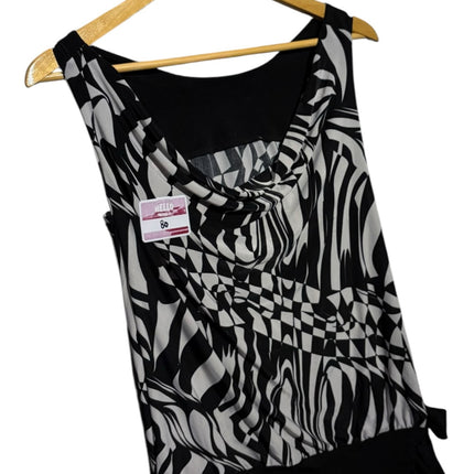 OutOf10 sleeveless cowl neck blouse in black and white with abstract zebra print and side tie detail on a hanger