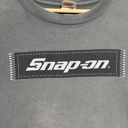 OutOf10 charcoal grey vintage cotton crewneck t-shirt with a rectangular Snap-on logo graphic and stitched detail.