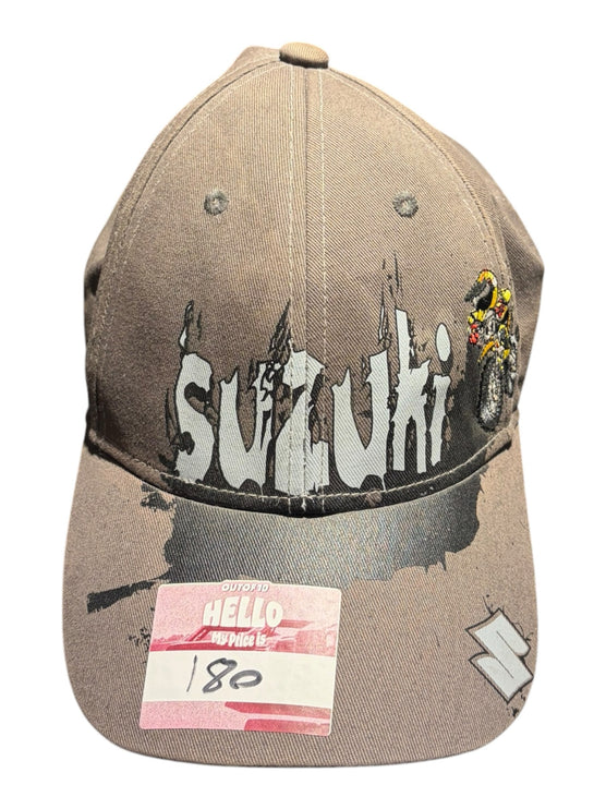 OutOf10 Suzuki graphic baseball cap in a neutral taupe colour with a distressed logo and structured pre-curved brim.