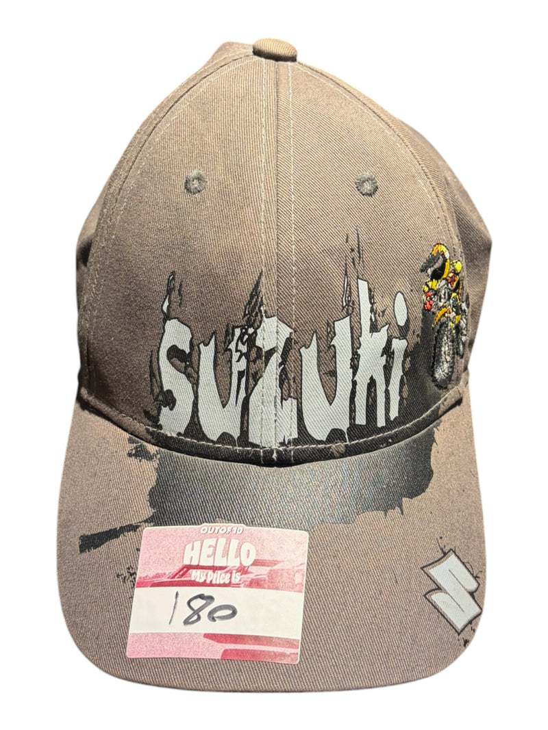 OutOf10 Suzuki graphic baseball cap in a neutral taupe colour with a distressed logo and structured pre-curved brim.