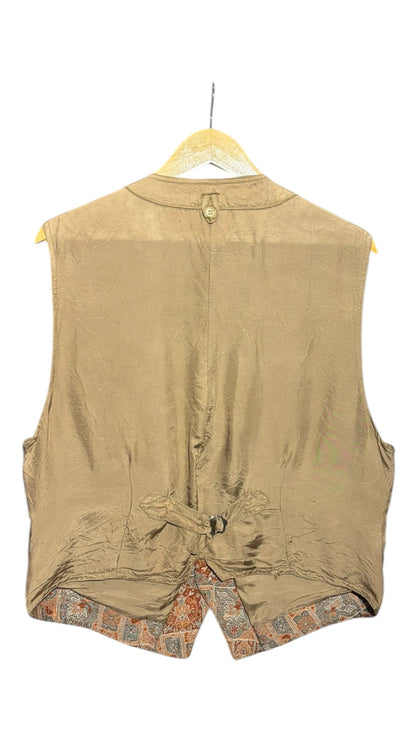 OutOf10 vintage-inspired waistcoat back view featuring solid tan fabric, adjustable cinch strap, and patterned hem.