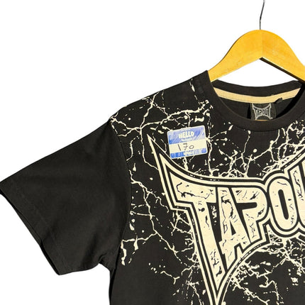 OutOf10 black Tapout graphic crewneck t-shirt with distressed white paint-splatter design on a wooden hanger.