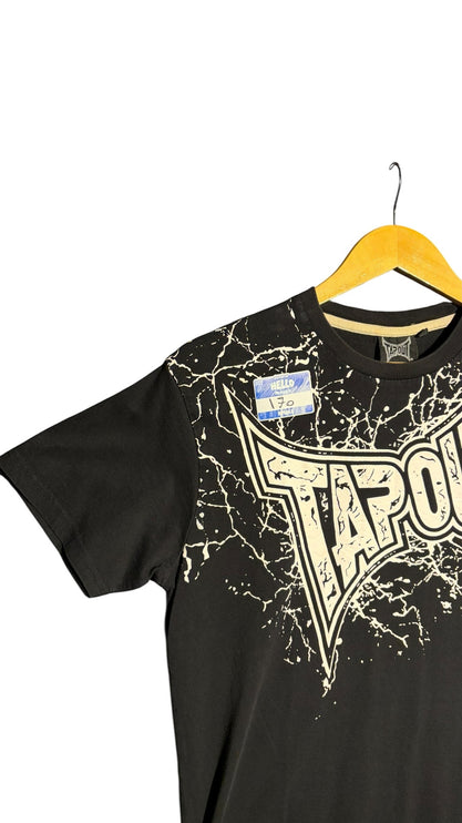 OutOf10 black Tapout graphic crewneck t-shirt with distressed white paint-splatter design on a wooden hanger.