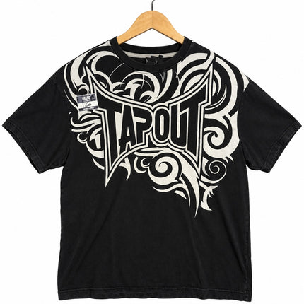 OutOf10 black cotton crew neck t-shirt featuring a large white tribal-inspired Tapout graphic print on the chest.
