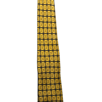 OutOf10 Teo Grimaldi silk necktie in golden-yellow with a navy blue grid pattern and geometric details.