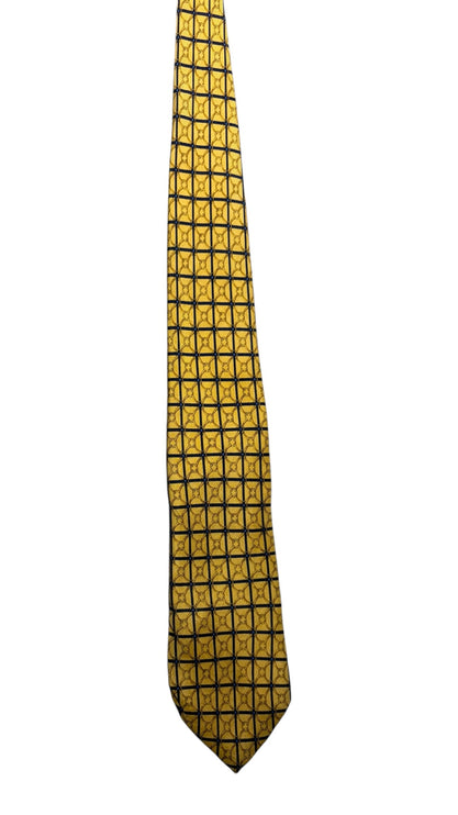OutOf10 Teo Grimaldi silk necktie in golden-yellow with a navy blue grid pattern and geometric details.