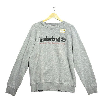 OutOf10 grey marl Timberland crewneck sweatshirt with heritage logo and ribbed trim on a wooden hanger