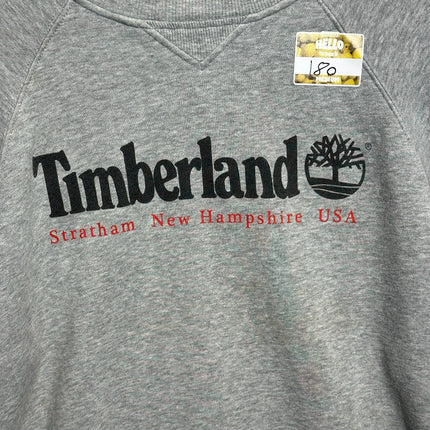 OutOf10 grey marl Timberland crewneck sweatshirt with black logo and V-stitch detail on a wooden hanger