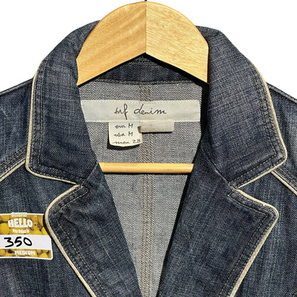 OutOf10 trf denim dark wash tailored blazer with contrast piping and lapel collar on a wooden hanger