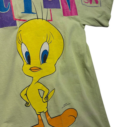 OutOf10 lime green cotton t-shirt featuring a Tweety Bird graphic and multi-coloured Whatever text print