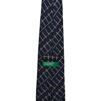 OutOf10 United Colors of Benetton navy blue necktie with a repeating grid logo pattern and green branded label.
