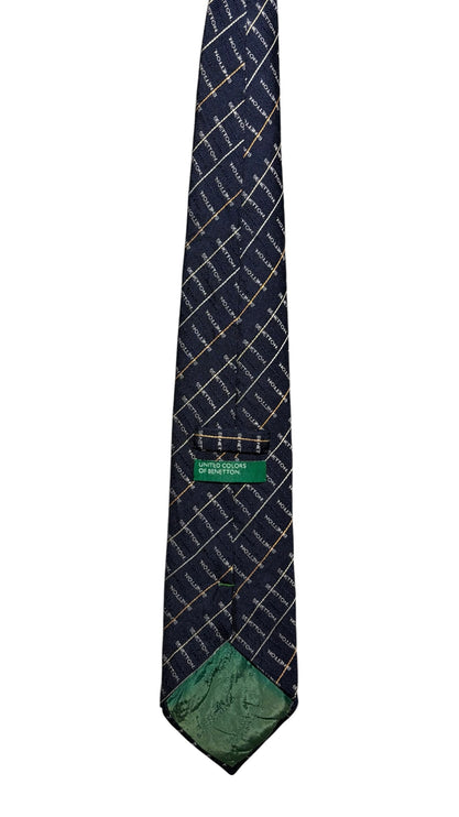 OutOf10 United Colors of Benetton navy blue necktie with a repeating grid logo pattern and green branded label.
