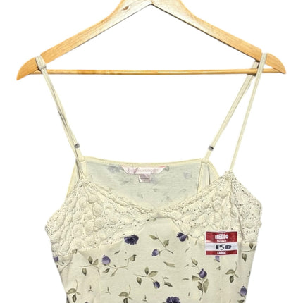OutOf10 Victoria's Secret cream camisole with purple floral print and intricate crochet lace trim on a wooden hanger