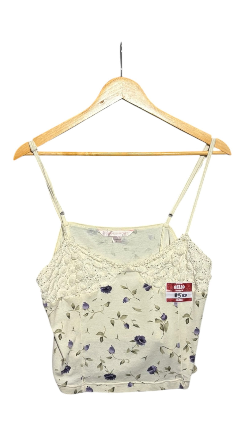 OutOf10 Victoria's Secret cream camisole with purple floral print and intricate crochet lace trim on a wooden hanger