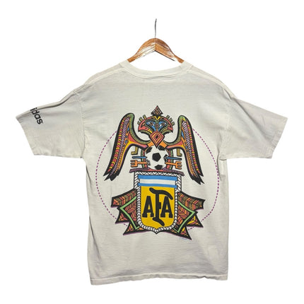 OutOf10 vintage 1993 Adidas Argentina football t-shirt with a vibrant tribal AFA crest graphic on the back
