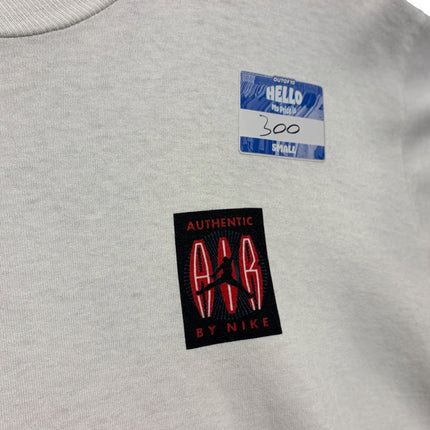 OutOf10 vintage off-white cotton crewneck t-shirt featuring an Authentic Air by Nike embroidered chest patch