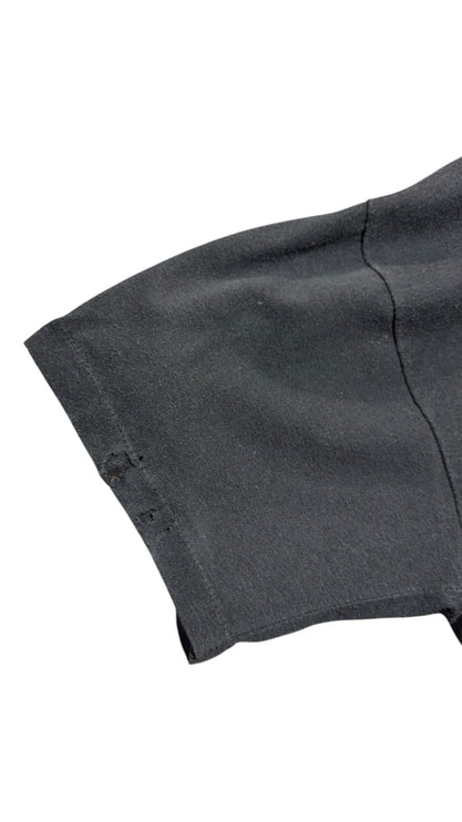 OutOf10 vintage black cotton t-shirt sleeve showing a small subtle distress detail for a worn-in racing aesthetic