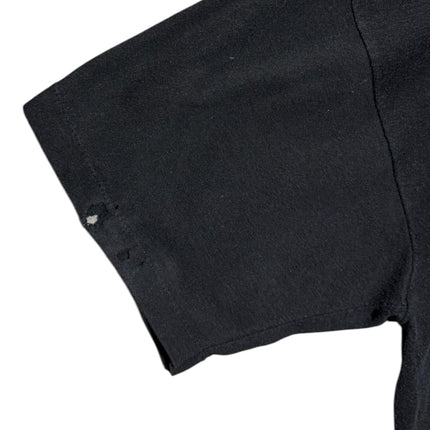 OutOf10 vintage black cotton t-shirt sleeve showing authentic distress marks and small holes from wear