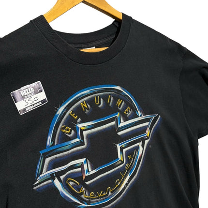 OutOf10 black cotton crewneck t-shirt featuring a vintage metallic Chevrolet bowtie graphic logo on the front