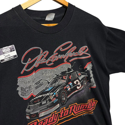 OutOf10 vintage black Dale Earnhardt Ready to Rumble graphic cotton t-shirt with NASCAR race car print on a hanger.