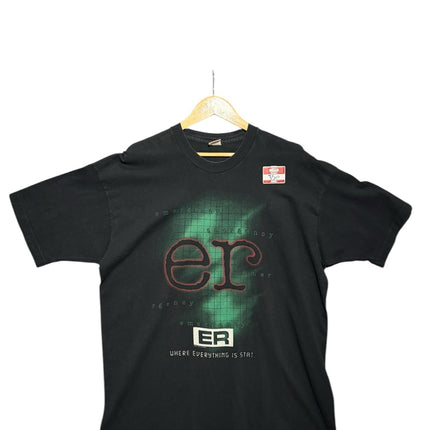 OutOf10 black cotton crew-neck t-shirt featuring a vintage ER television show graphic with green and red accents.