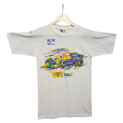 OutOf10 vintage white Formula 1 graphic t-shirt featuring a colorful Benetton race car illustration on a hanger.