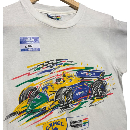OutOf10 vintage white Benetton Formula 1 t-shirt with a vibrant painterly race car graphic and Camel branding