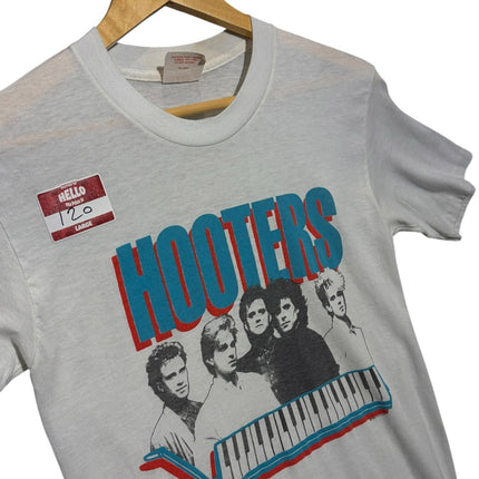 OutOf10 vintage light grey Hooters band graphic crewneck t-shirt with keyboard print on a wooden hanger