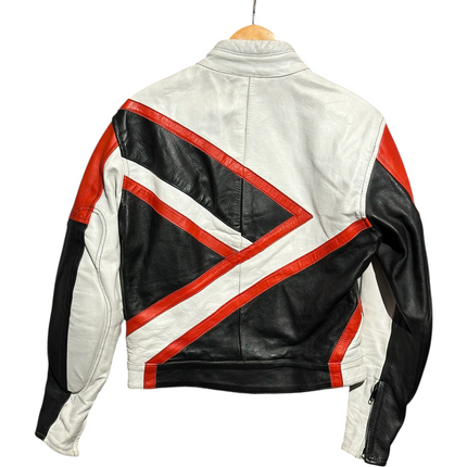 Back view of an OutOf10 vintage leather motorcycle jacket featuring a white, black, and red geometric panel design.
