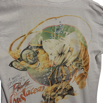 OutOf10 off-white cotton t-shirt featuring a vintage graphic print of a lobster wearing diving gear on a wooden hanger.