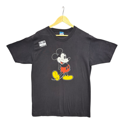 OutOf10 black cotton crewneck t-shirt featuring a vintage Mickey Mouse graphic print on a wooden hanger.
