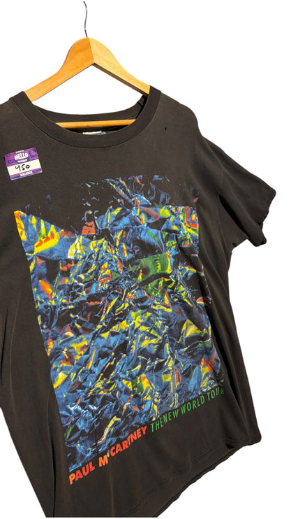 OutOf10 vintage black Paul McCartney The New World Tour cotton t-shirt with a vibrant abstract graphic print.