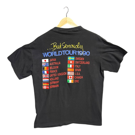 Back view of OutOf10 vintage black Phil Collins 1990 But Seriously world tour cotton t-shirt with international flags