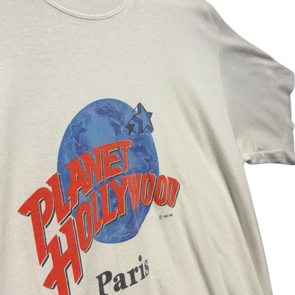 OutOf10 vintage white cotton crewneck t-shirt featuring a red and blue Planet Hollywood Paris graphic logo