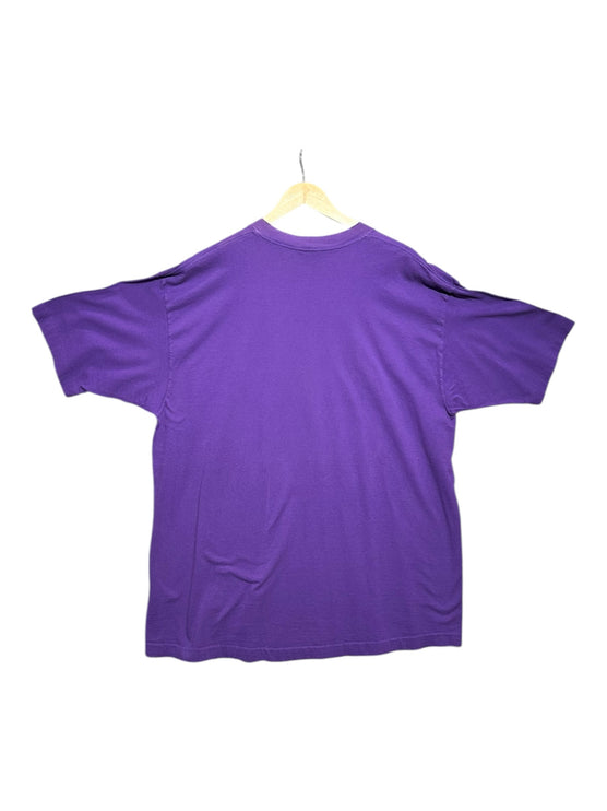 OutOf10 vintage purple cotton t-shirt with a plain back, hanging on a wooden hanger against a white background.