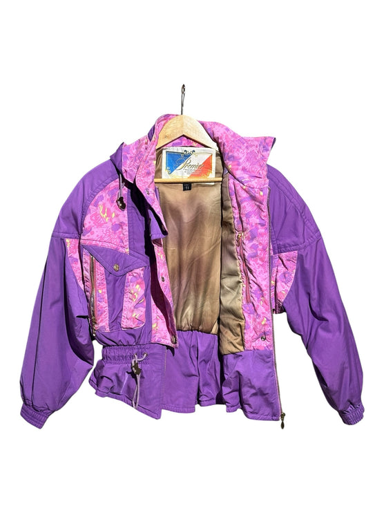 OutOf10 vintage Premier hooded ski jacket in purple with pink and yellow abstract floral pattern and gold hardware.