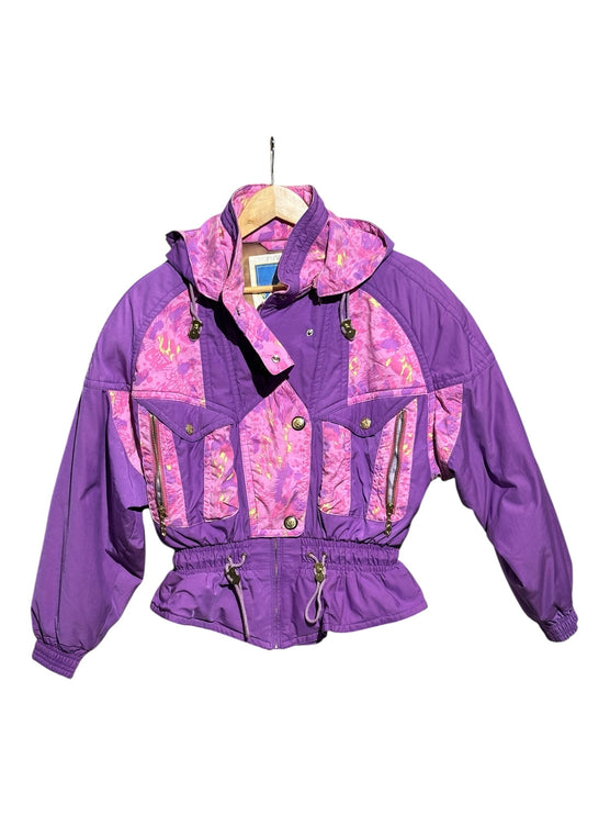 OutOf10 vintage 80s purple ski jacket with pink and yellow floral pattern, hooded design, and gold-tone hardware.