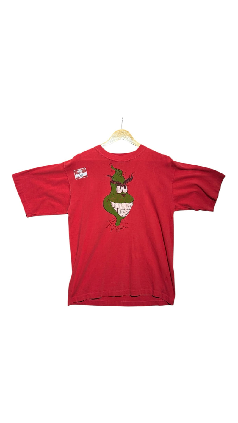 OutOf10 vintage red short sleeve crewneck t-shirt featuring a green Grinch graphic illustration on the chest.