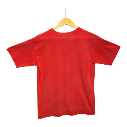 OutOf10 vintage red short sleeve t-shirt with a plain back, hanging on a wooden hanger against a white background.