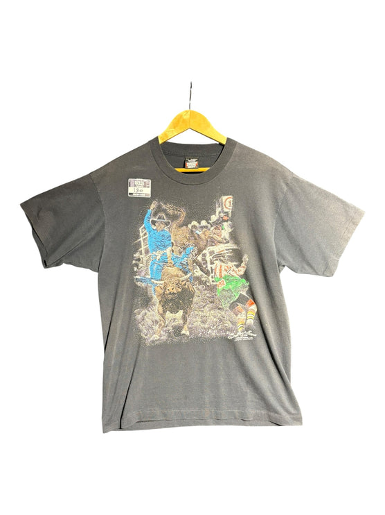 OutOf10 vintage black cotton t-shirt featuring a vibrant bull riding rodeo graphic print on a relaxed crew-neck fit.